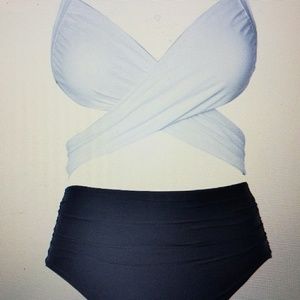 Brand New with tags adorable swimsuit.